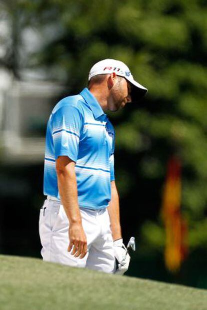 Sergio Garc&iacute;a reacts after a shot on the first hole during the third round of the 2012 Masters. 