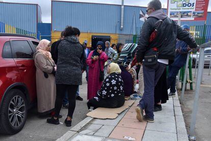 A group of porters wait together at the Ceuta border last Thursday.