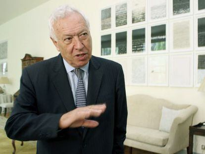 Foreign Minister Jos&eacute; Manuel Garc&iacute;a Margallo talks to the press on Friday from China.