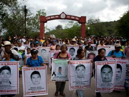 Parents of missing students from Ayotzinapa, accompanied by hundreds of supporters, at the entrance to the school, in Tixtla, Guerrero State, Mexico, Saturday, June 6, 2015.