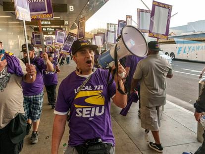 Los Angeles city employees with SEIU Local 721 join a picket line at the Los Angeles International Airport in Los Angeles on Aug. 8, 2023.