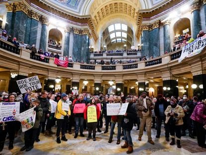 Protesters are seen in the Wisconsin Capitol Rotunda during a march supporting overturning Wisconsin's near total ban on abortion, Jan. 22, 2023, in Madison, Wis.
