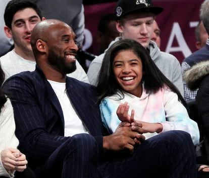 Kobe Bryant and his daughter Gianna, at a basketball game in New York in December 2019.