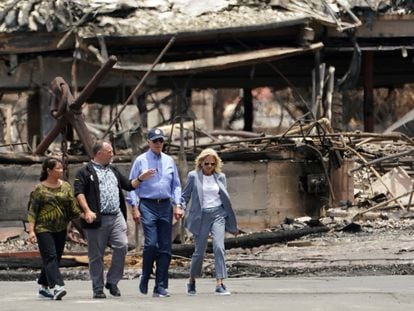 U.S. President Joe Biden and first lady Jill Biden walk with Hawaii Governor Josh Green and his wife Jaime Green as they tour the fire-ravaged town of Lahaina on the island of Maui in Hawaii, on August 21, 2023.