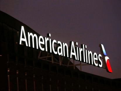 The American Airlines logo on top of the American Airlines Center in Dallas, Texas, is pictured on Dec. 19, 2017.