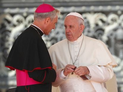 Pope Francis talks with Archbishop Georg Gänswein during the Wednesday general audience in St. Peter’s square at the Vatican.