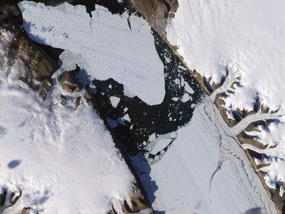 This Aug. 16, 2010, image provided by NASA Earth Observatory shows a piece of the Petermann Glacier that cracked in Greenland.