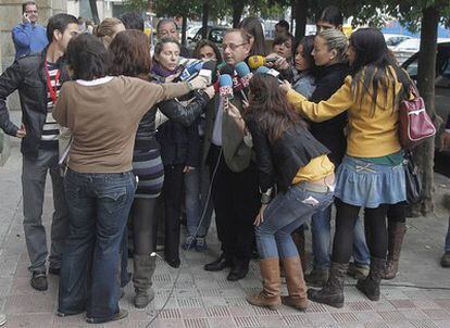 Marta del Castillo's father speaks to journalists outside court on Wednesday.