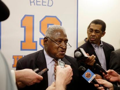 New York Knicks Hall-of-Famer Willis Reed responds to questions during an interview before an NBA basketball game between the Knicks and the Milwaukee Bucks in April 2013.