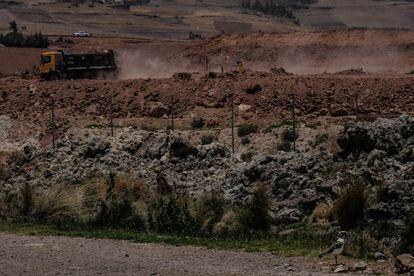 A truck works on the construction of the runway for the new Chinchero airport.