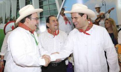A 2015 shot of Javier Duarte (l) greeting Zacatecas governor Miguel Alonso Reyes, who is now being investigated for embezzlement.