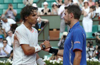 Rafael Nadal shakes hand with Stanislas Wawrinka after their match. 