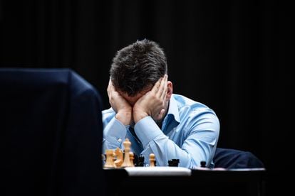 Ian Nepomniachtchi in deep concentration after Ding's unprecedented fourth move in Astana. 