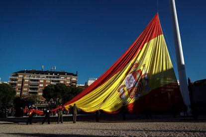 The Spanish flag is raised at Plaza de Colón in Madrid to observe Constitution Day.