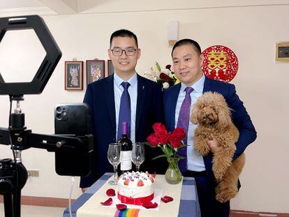 Zhijun (right) and Jungang during their online wedding ceremony. Zhijun holds their dog, ‘Dajuzi’, which means double happiness in Chinese.