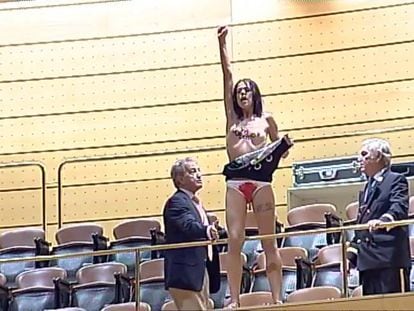Video: A Femen activist protests abortion reform.