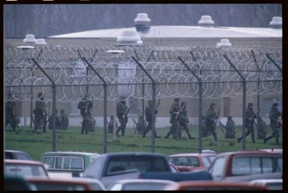 The National Guard surrounds the Southern Ohio Correctional Facility during a prison riot in which prison guards were taken hostage by the inmates