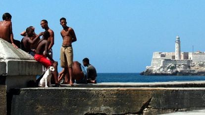 A group of young people at the Malecón in Havana, Cuba.