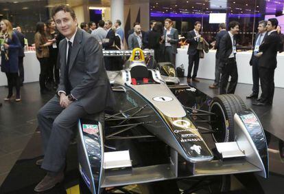 Alejandro Agag poses with a Formula E car in London last November.  