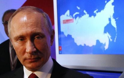 Russian President Vladimir Putin attends the Community Forum in Moscow.
