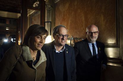 Catalan premier Quim Torra (center) arrives at the Together for Catalonia headquarters in Barcelona.