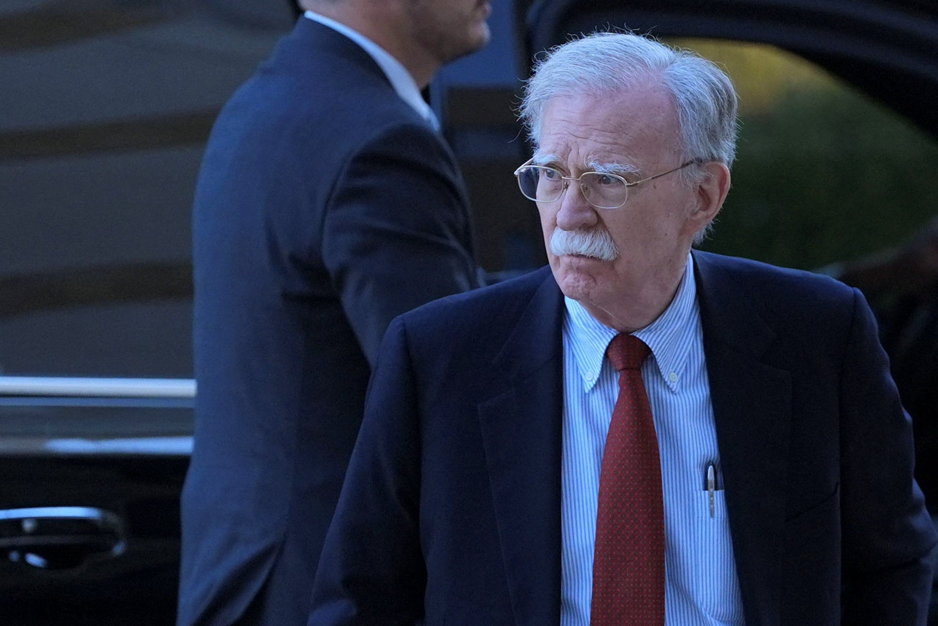 Former Trump adviser John Bolton pleads not guilty to 18 counts of mishandling classified information