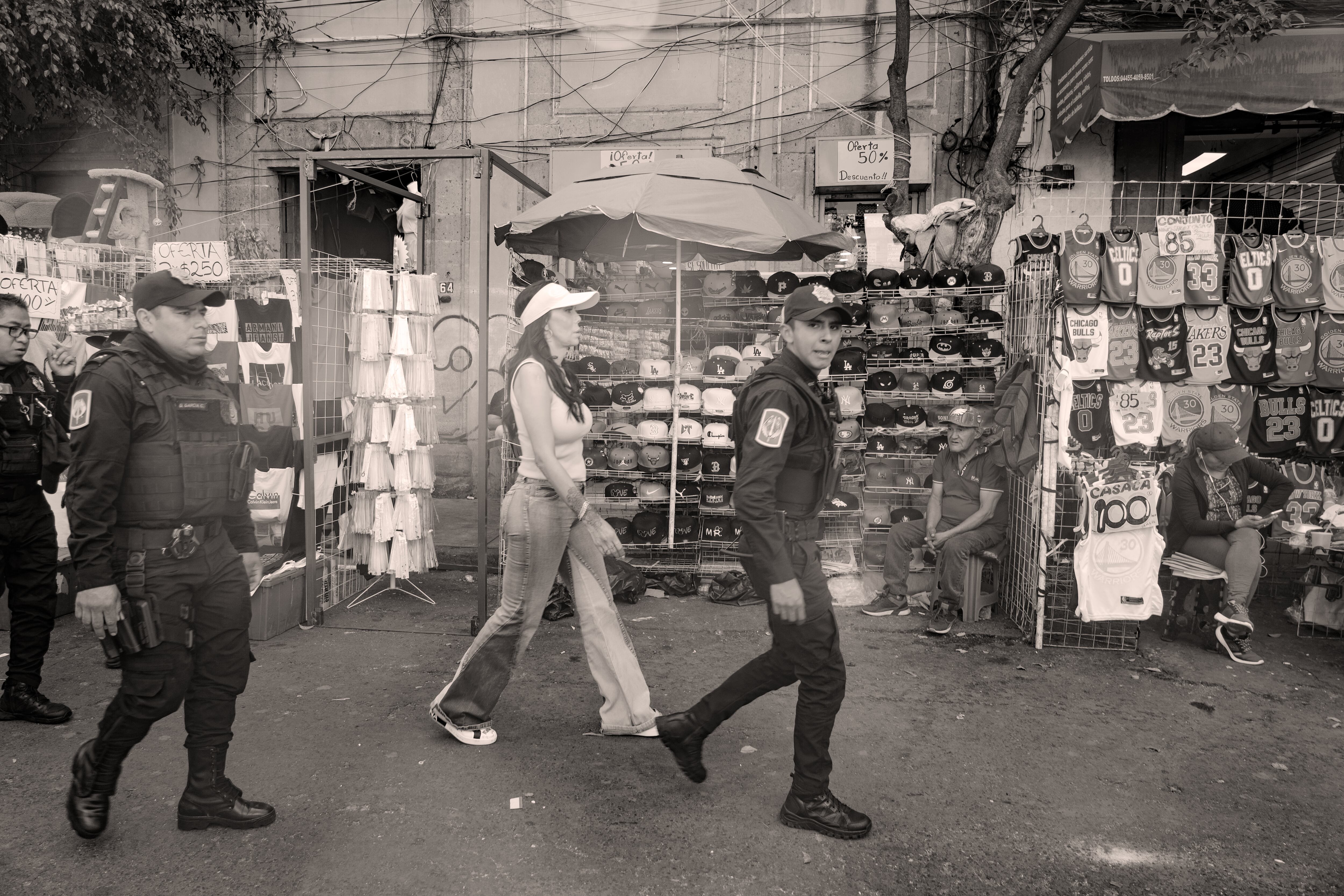 Diana Sánchez Barrios tours the historic center of Mexico City accompanied by her security guard.