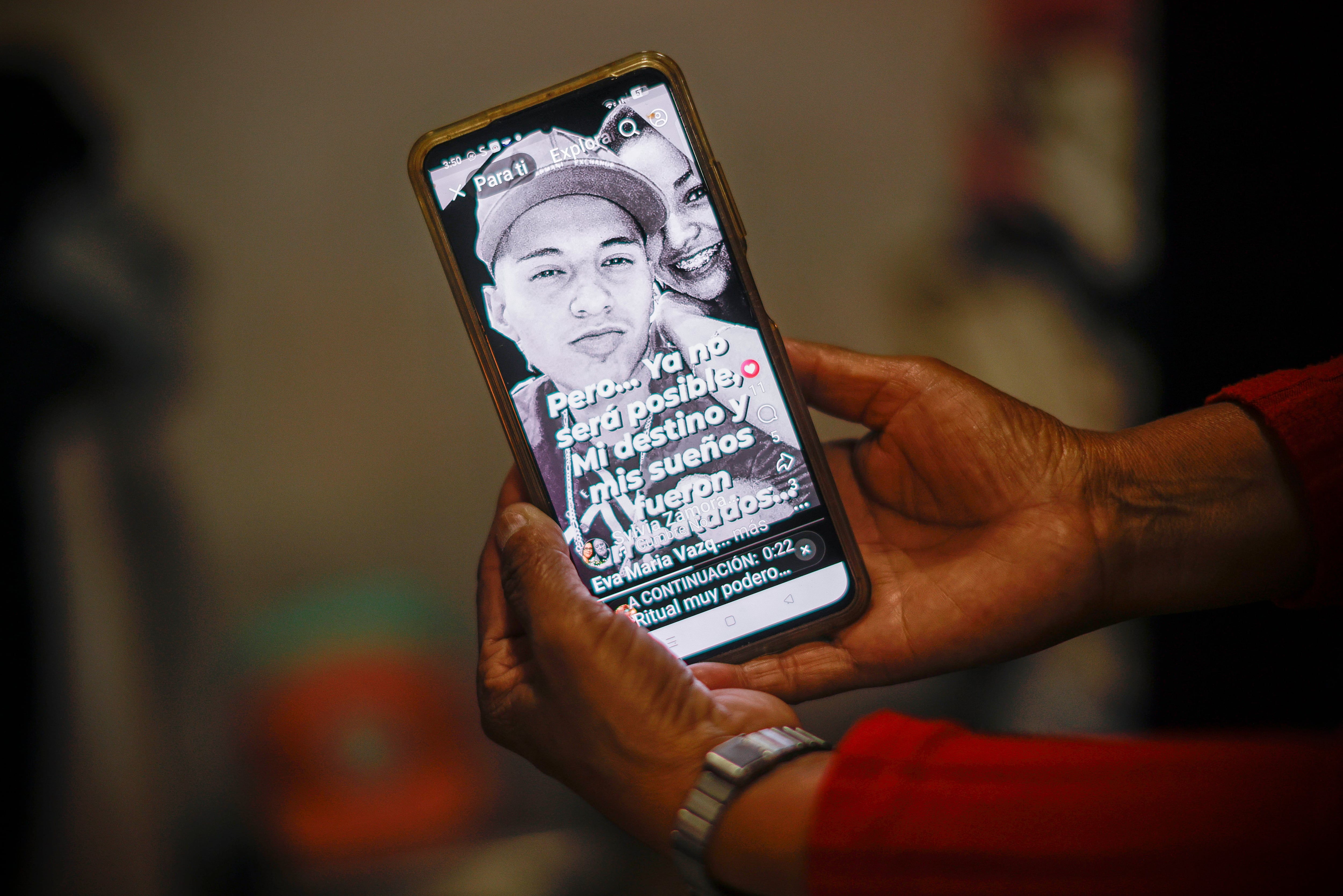 Eva shows a photo of her murdered son. 