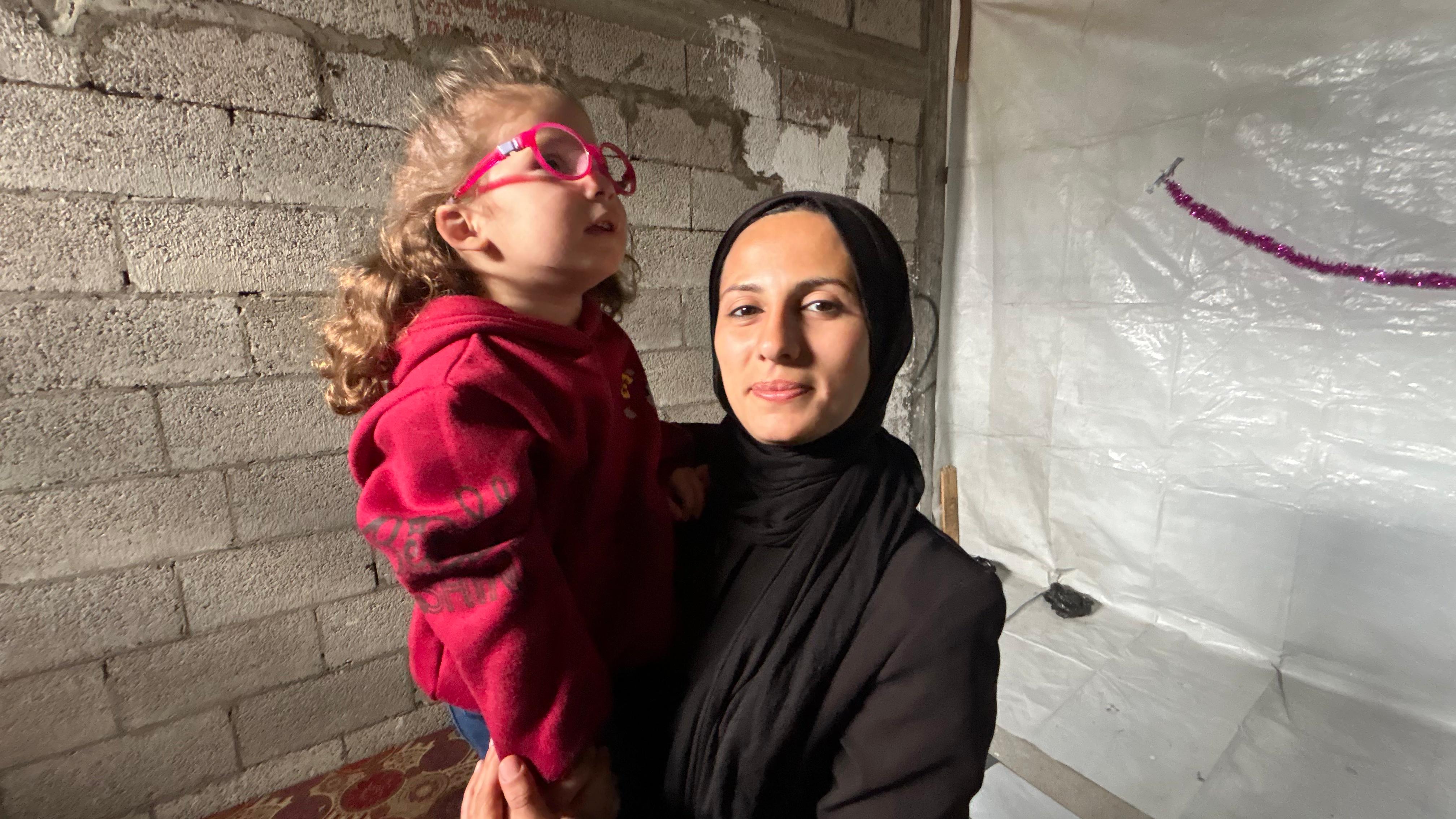 Sundus al-Kurd and her daughter Bissam, in Gaza City, in April 2026.