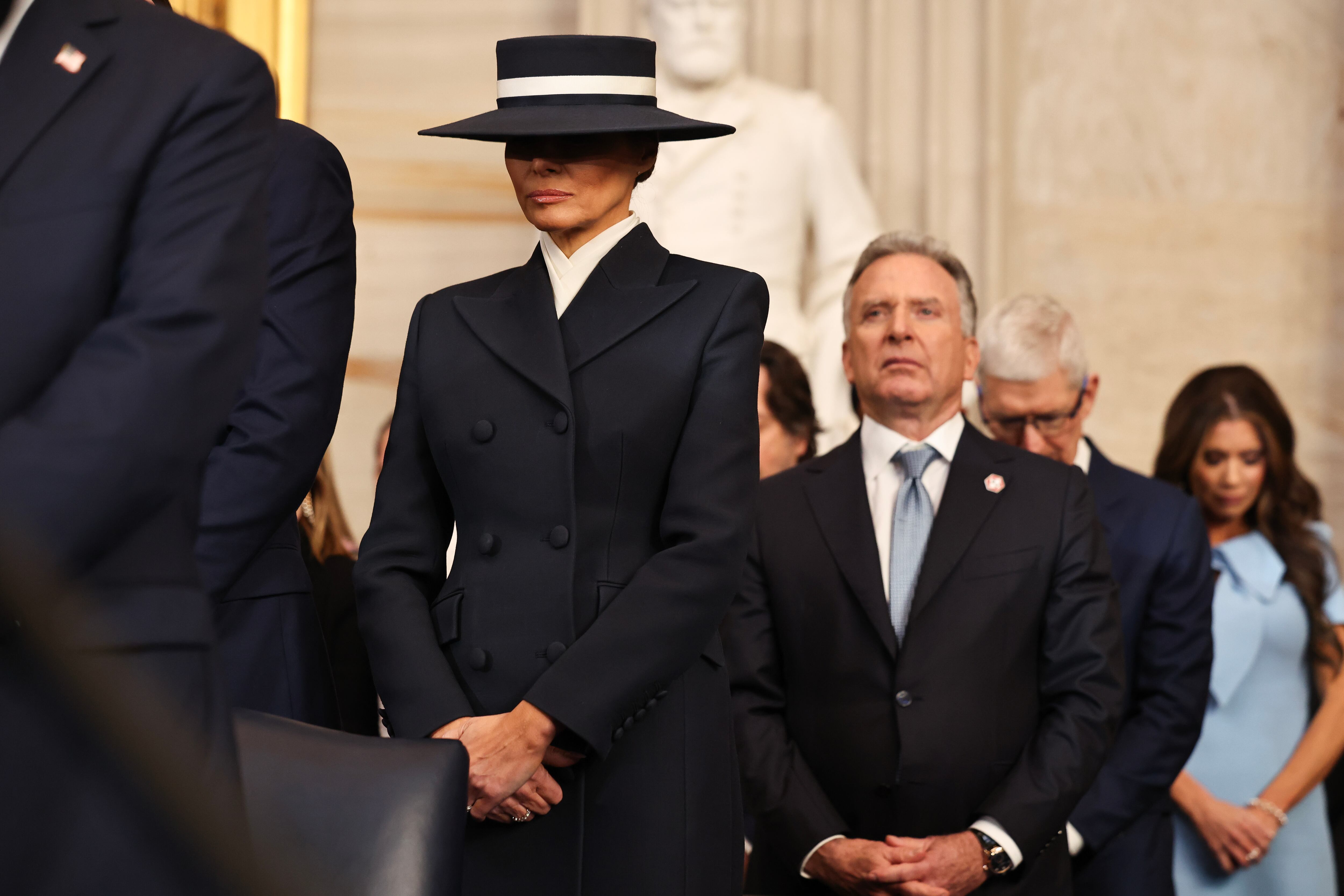 Melania Trump conceals her gaze with a hat that triggers memes on social media