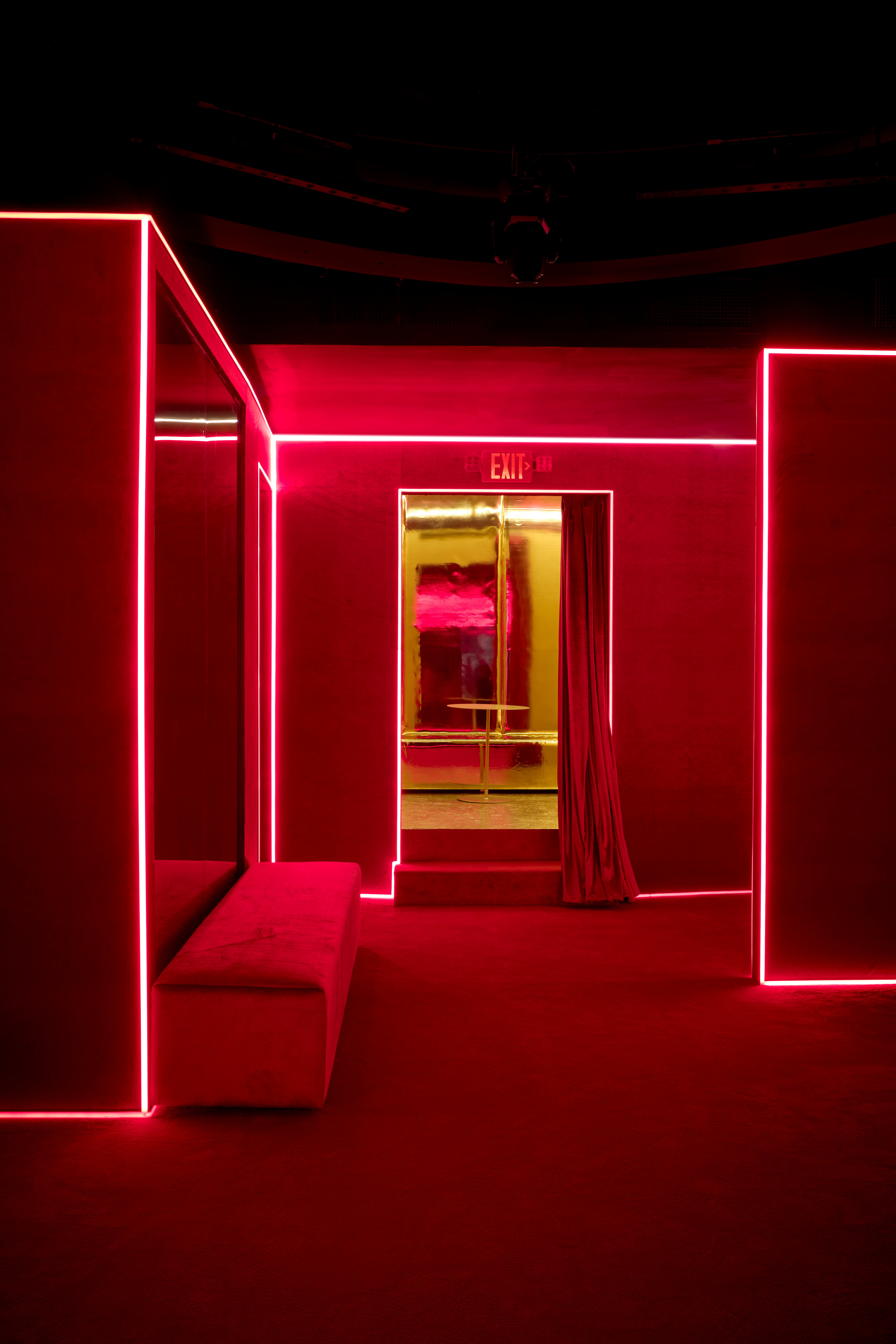 An endless red velvet blanket stretching from floor to ceiling – bordered by pink neon and gold walls – is Harry Nuriev's vision of the new branch of Silencio in New York.

