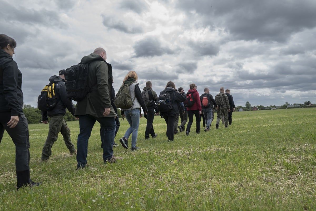 A group of civilians heads to the next task during the military training that Poland organizes on Saturdays.