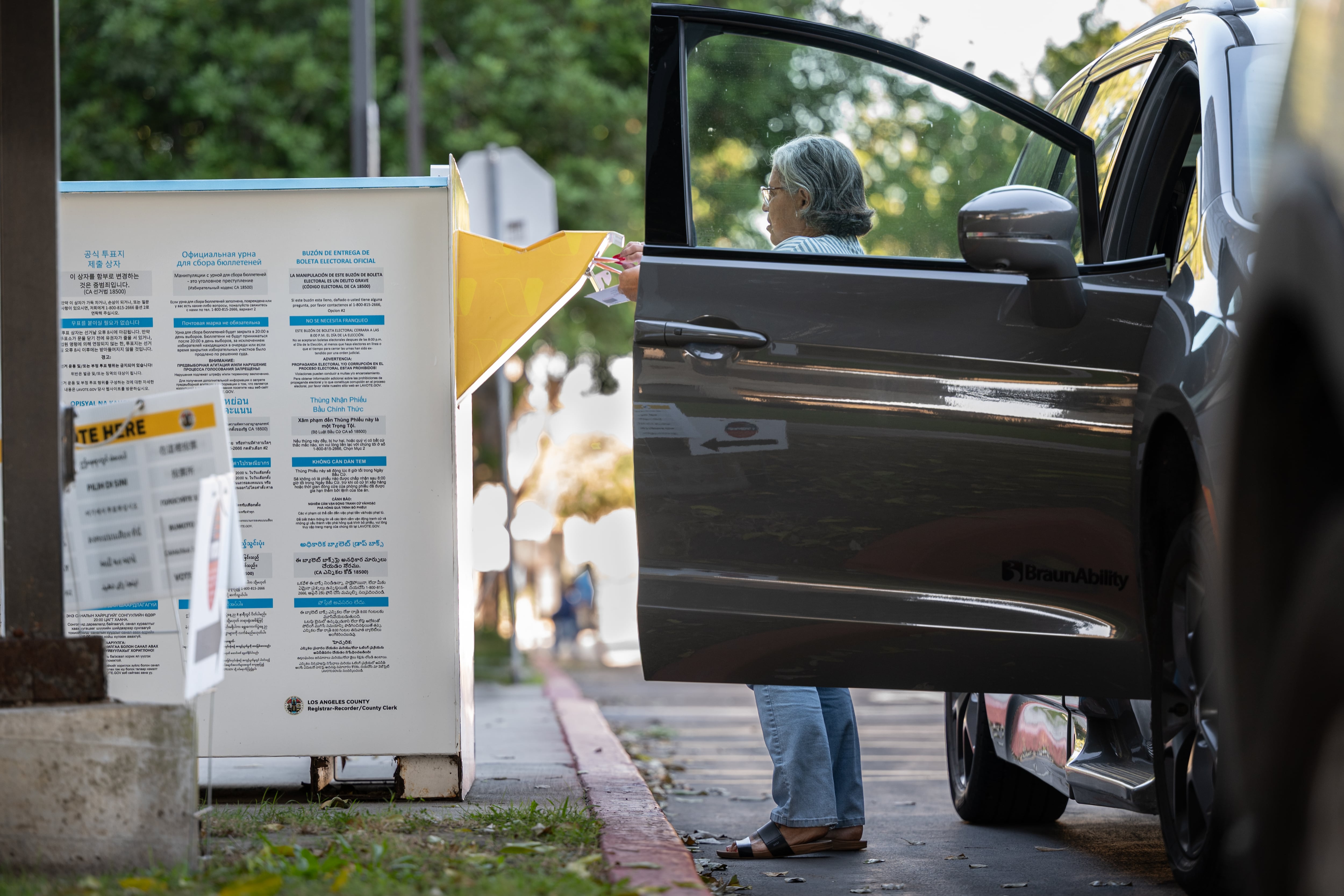 Gloria Tiscareño casts her ballot for the midterm election in Los Angeles.