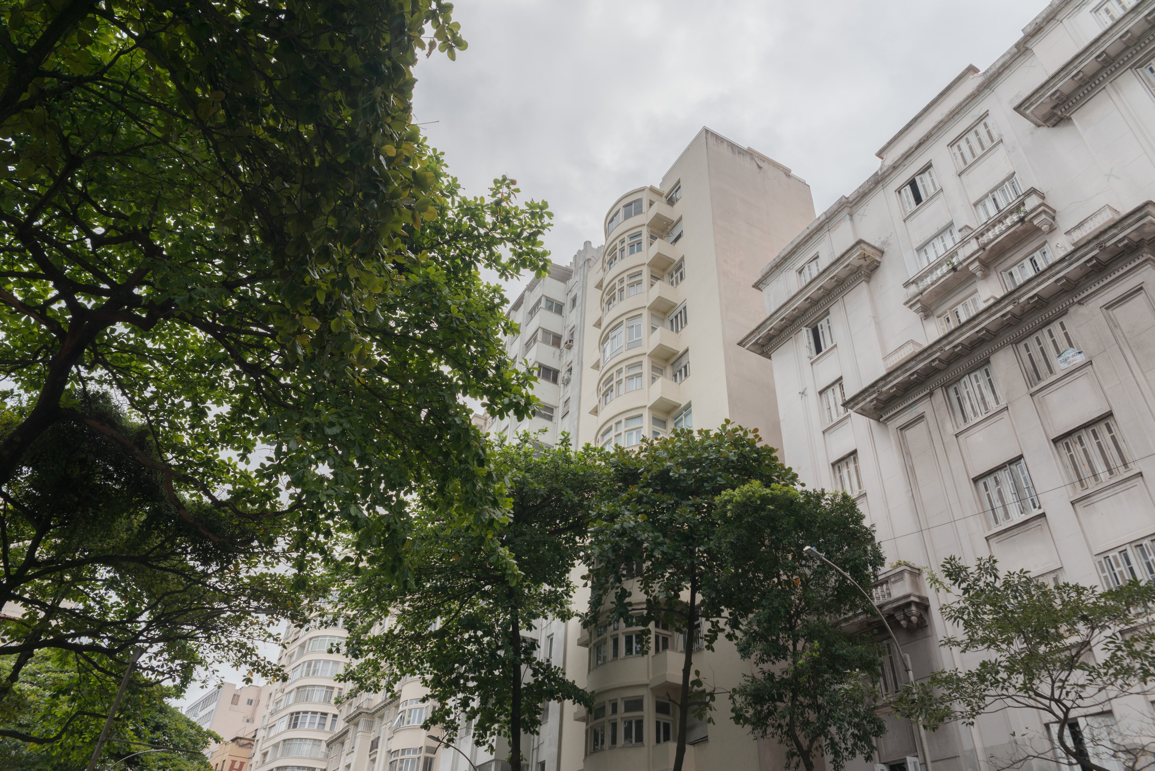 At the center, the façade of the building where Ângela Valério lives, in Copacabana, Rio de Janeiro, Brazil.