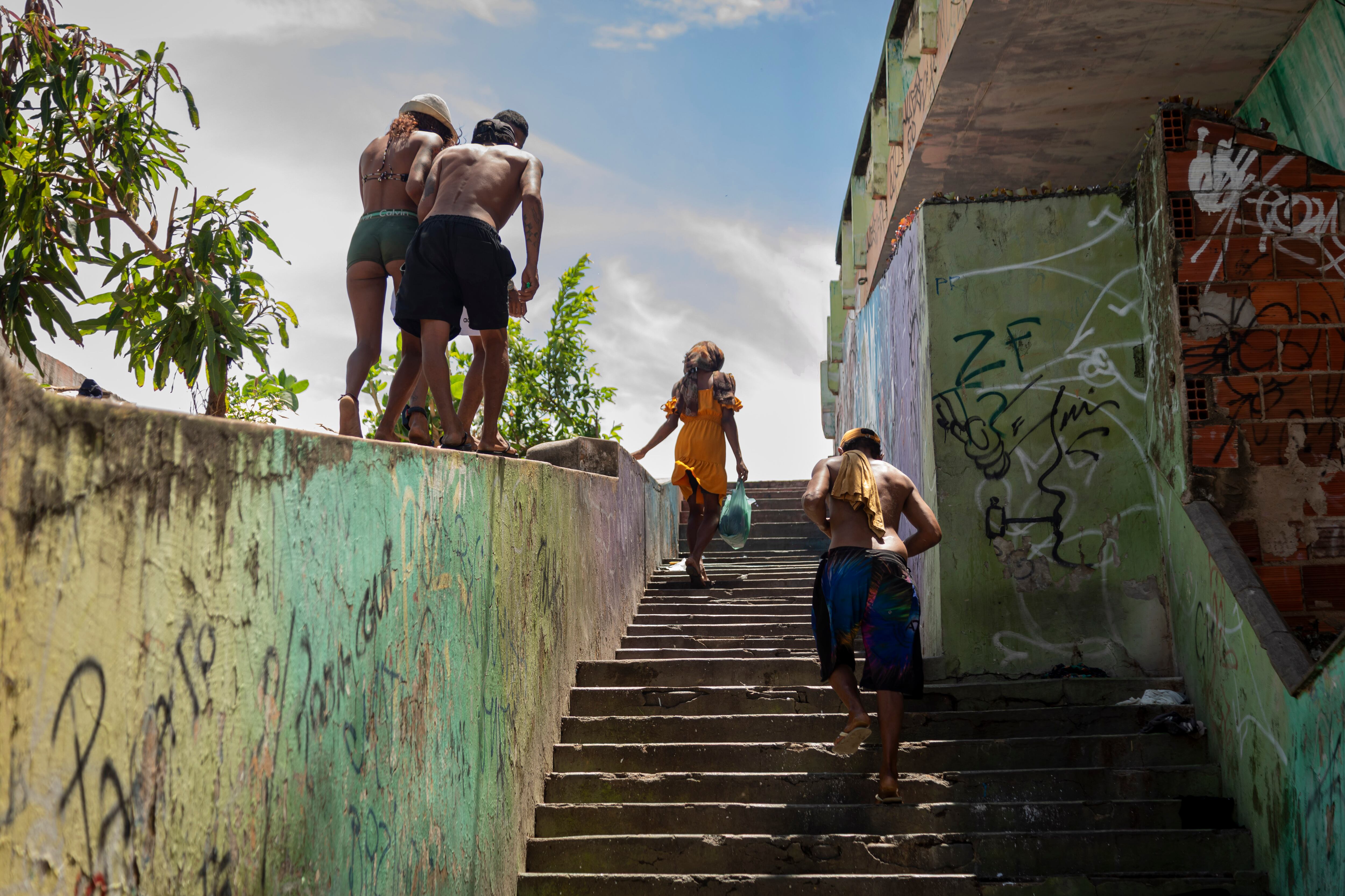 A group of people who are addicted to crack cocaine climb a staircase in Fortaleza, Brazil, on February 9, 2026. 