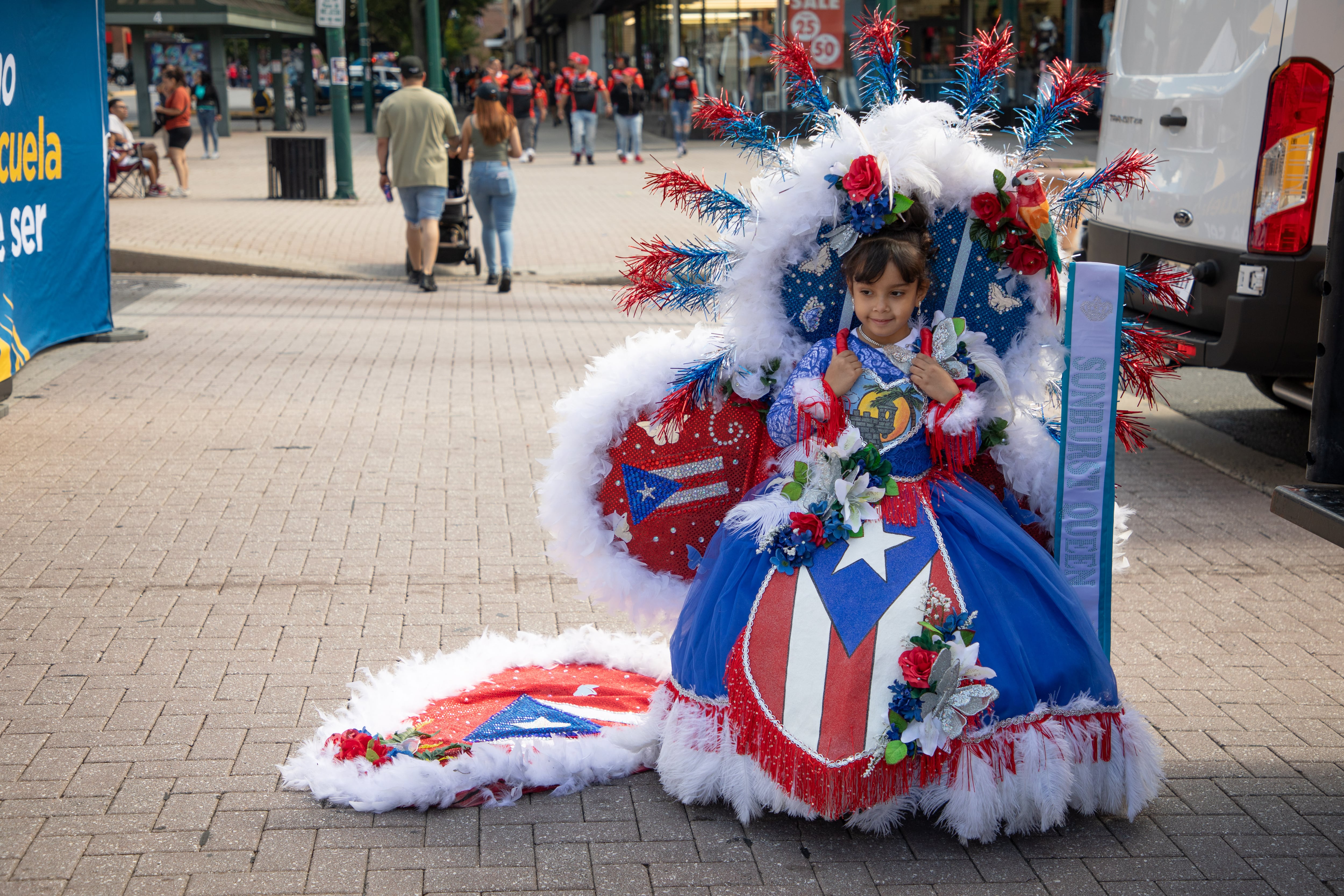 A girl waits for the start of the Puerto Rico Festival in Reading, Pennsylvania, on September 8.