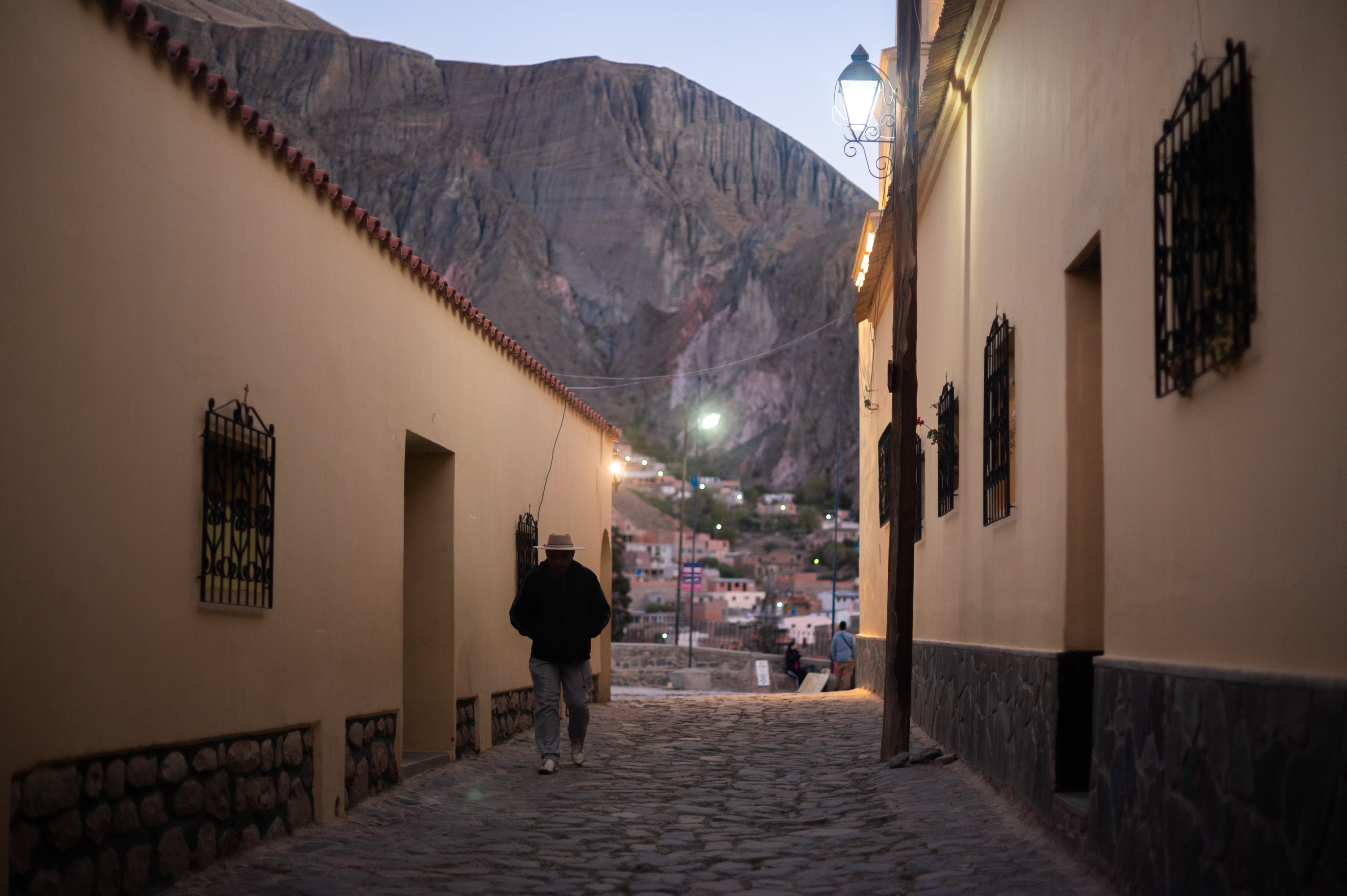 A resident of Iruya walking through town on August 31, 2026.