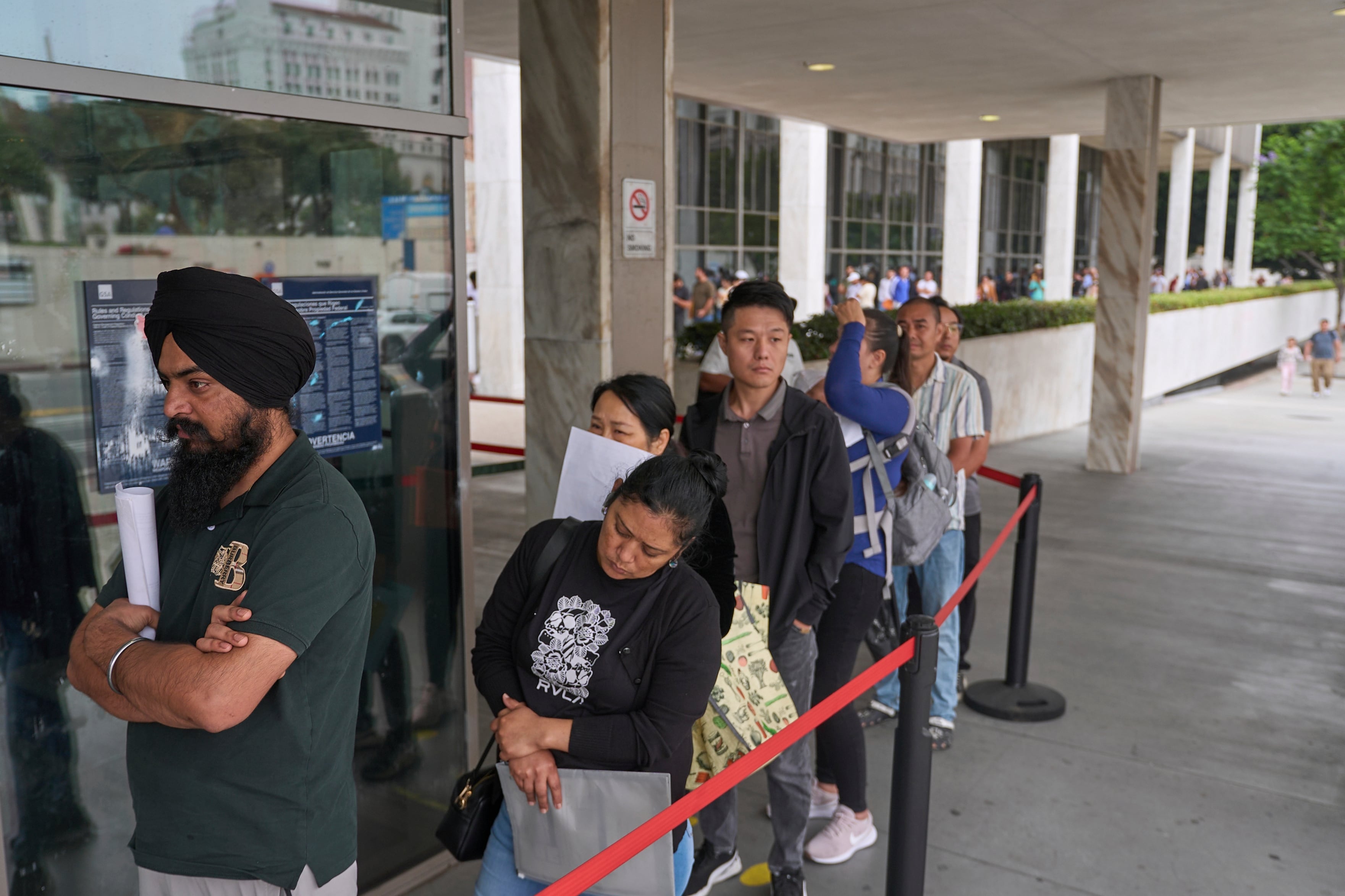 Trump’s new restrictions leave no migrant safe: ‘Being a legal resident in the US is being a second-class citizen’