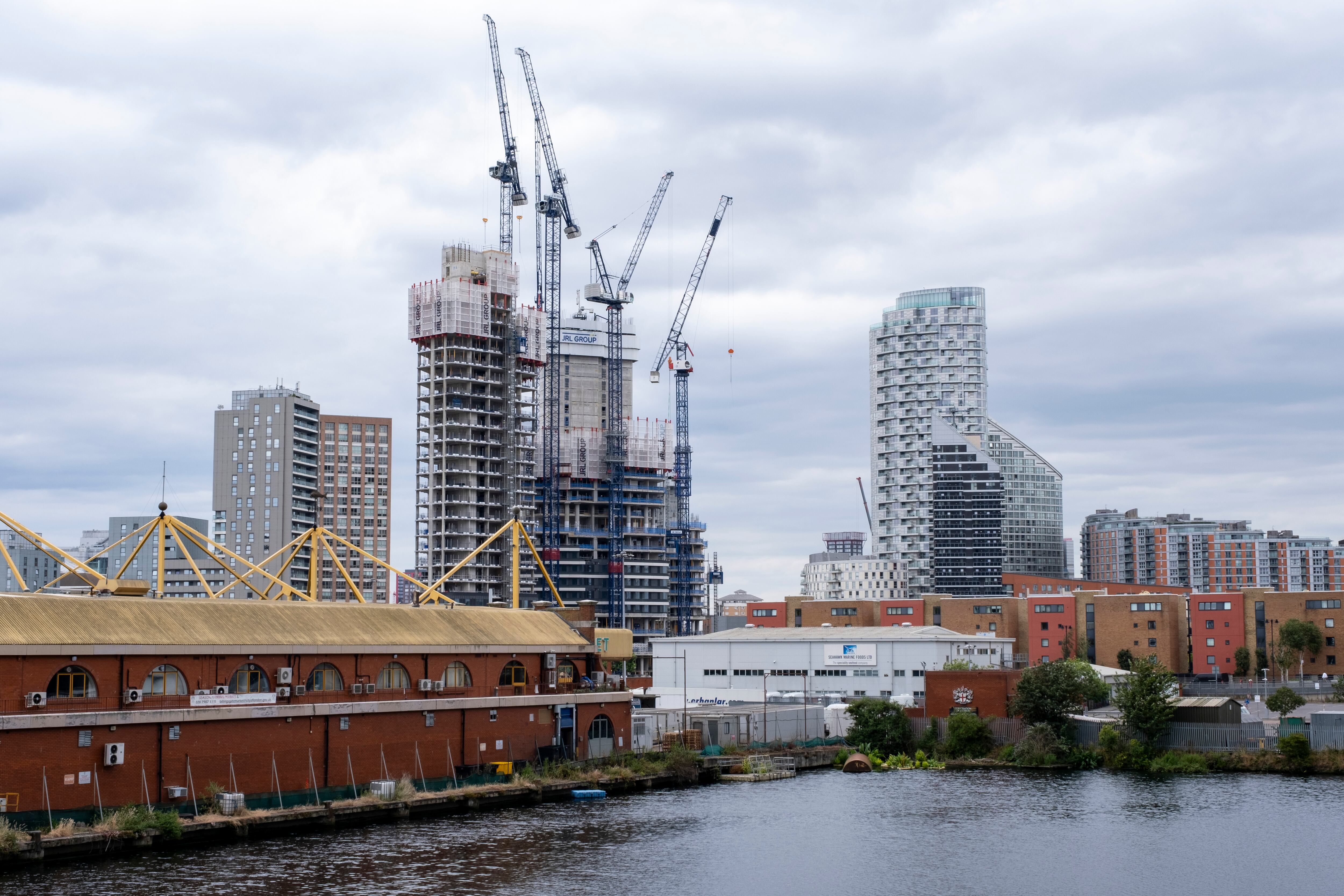 Housing under construction in Poplar and Canning Town, near the Canary Wharf financial district in London.