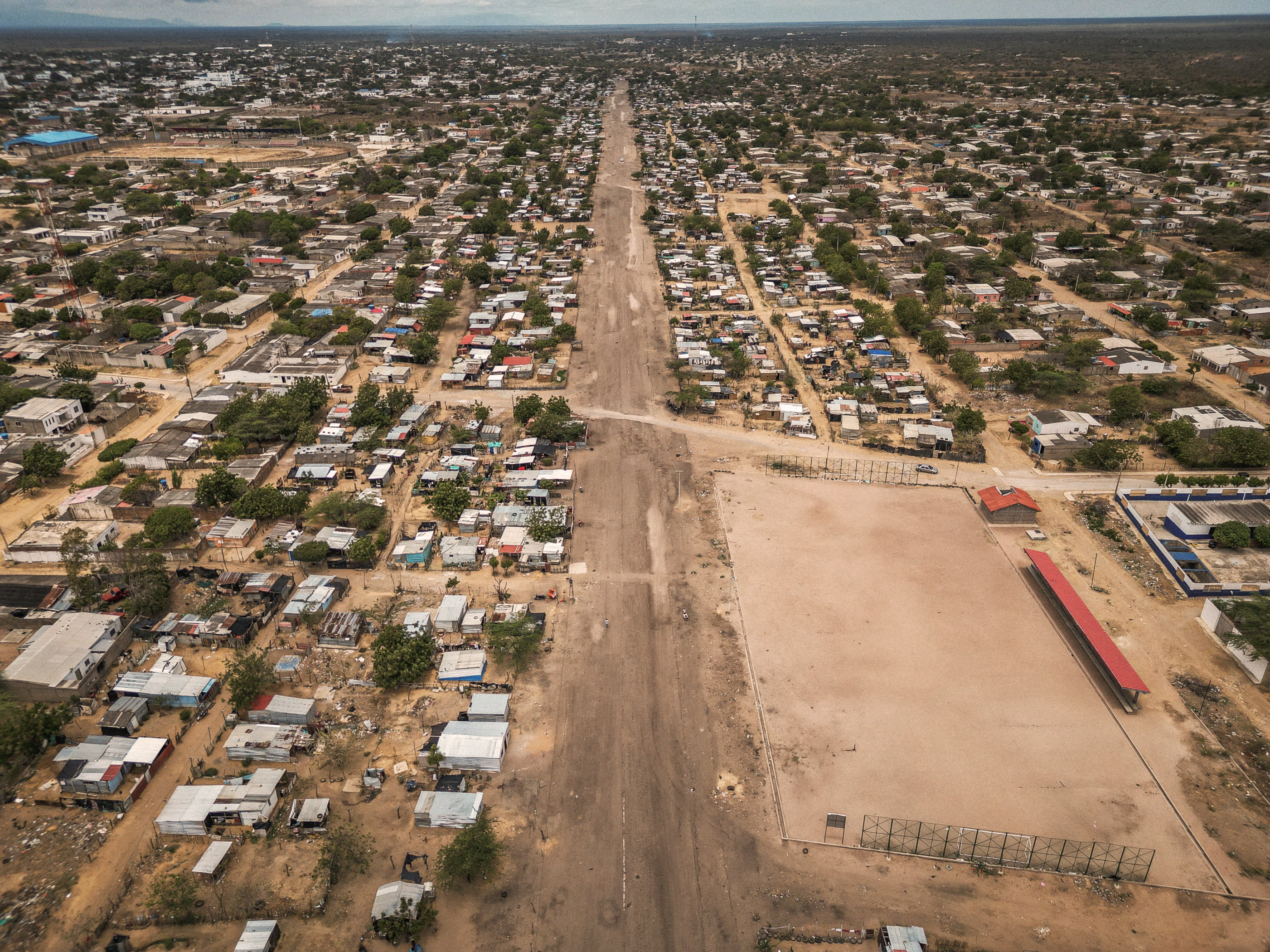 Aerial view of La Pista, La Guajira (Colombia), the largest informal settlement in Latin America.
