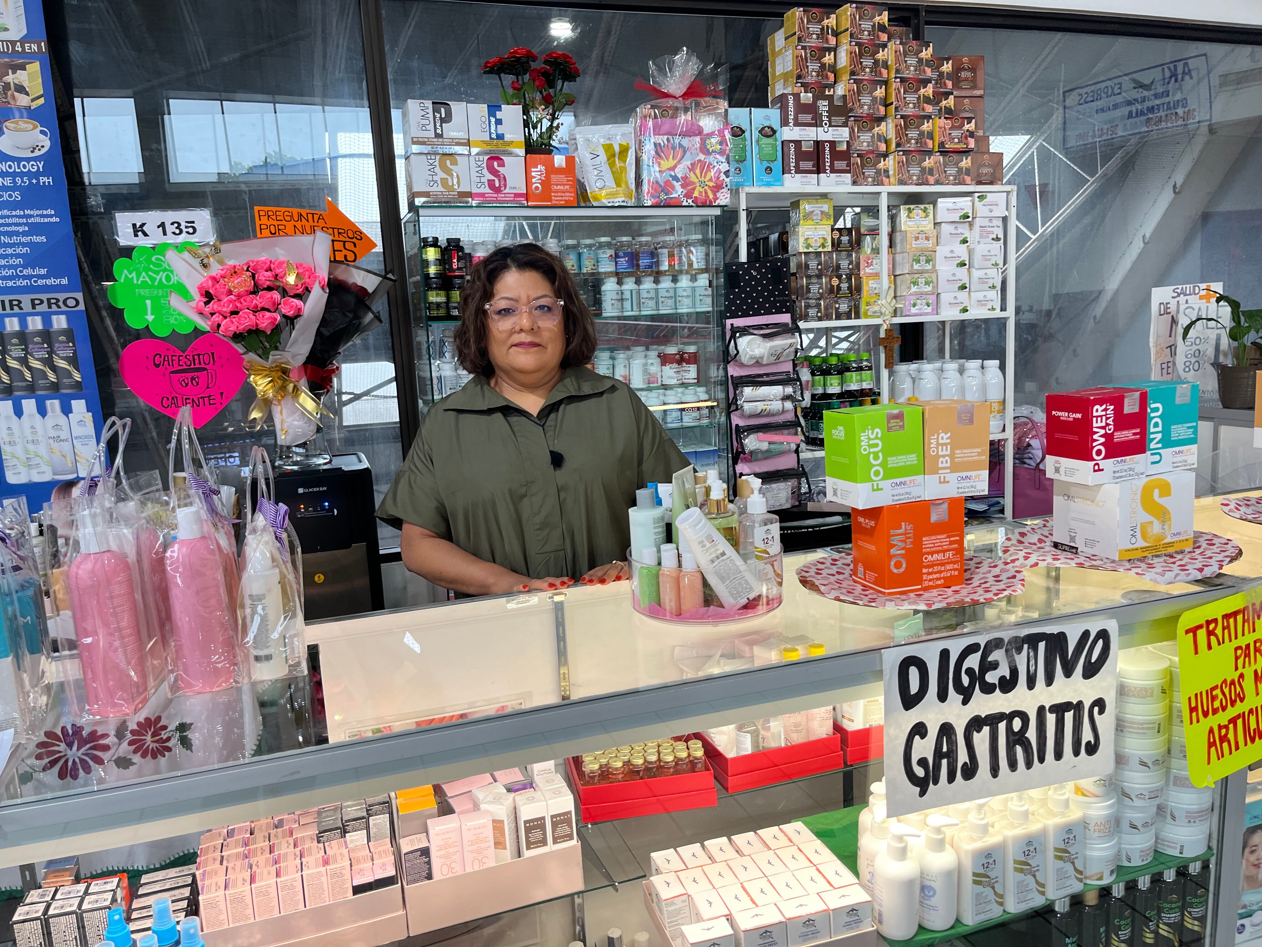 Flavia Rodríguez in her cosmetics and nutrition store in Maryland. 