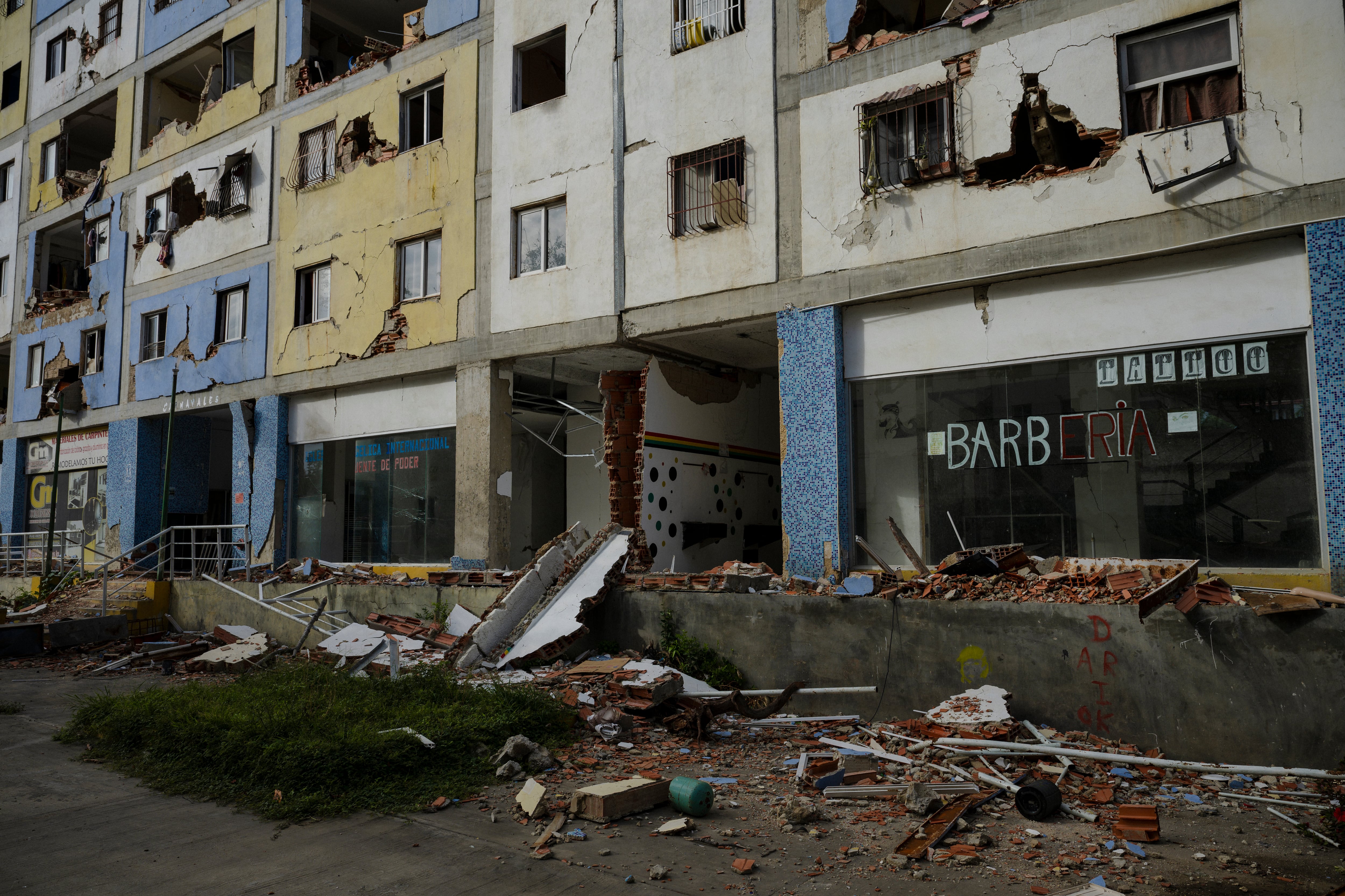 View of a building damaged by the earthquake where several businesses used to operate.