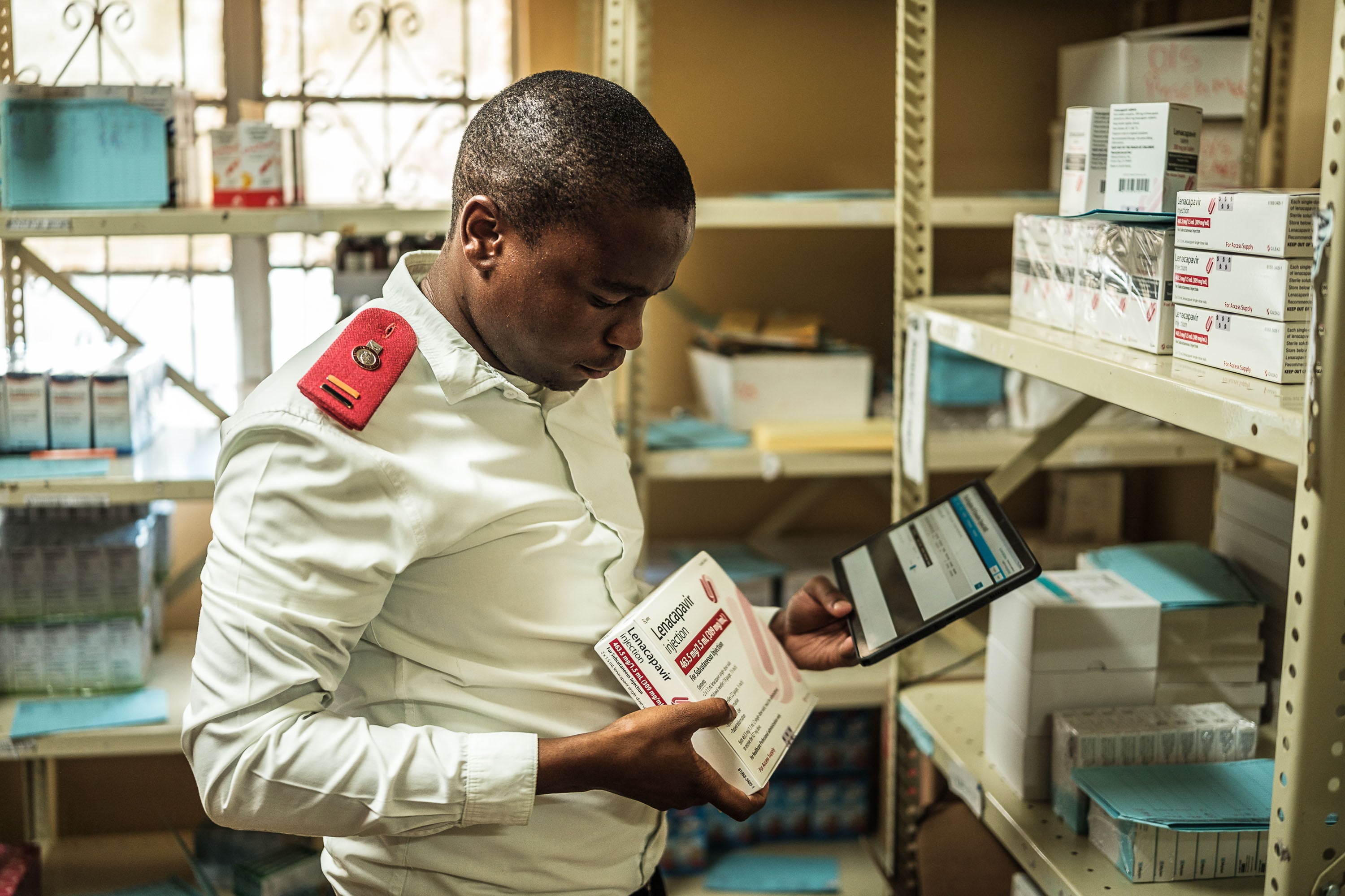 A healthcare worker records a dose of lenacapavir at a clinic in Eswatini, where several thousand doses of this HIV preventive medication began to be distributed in December.