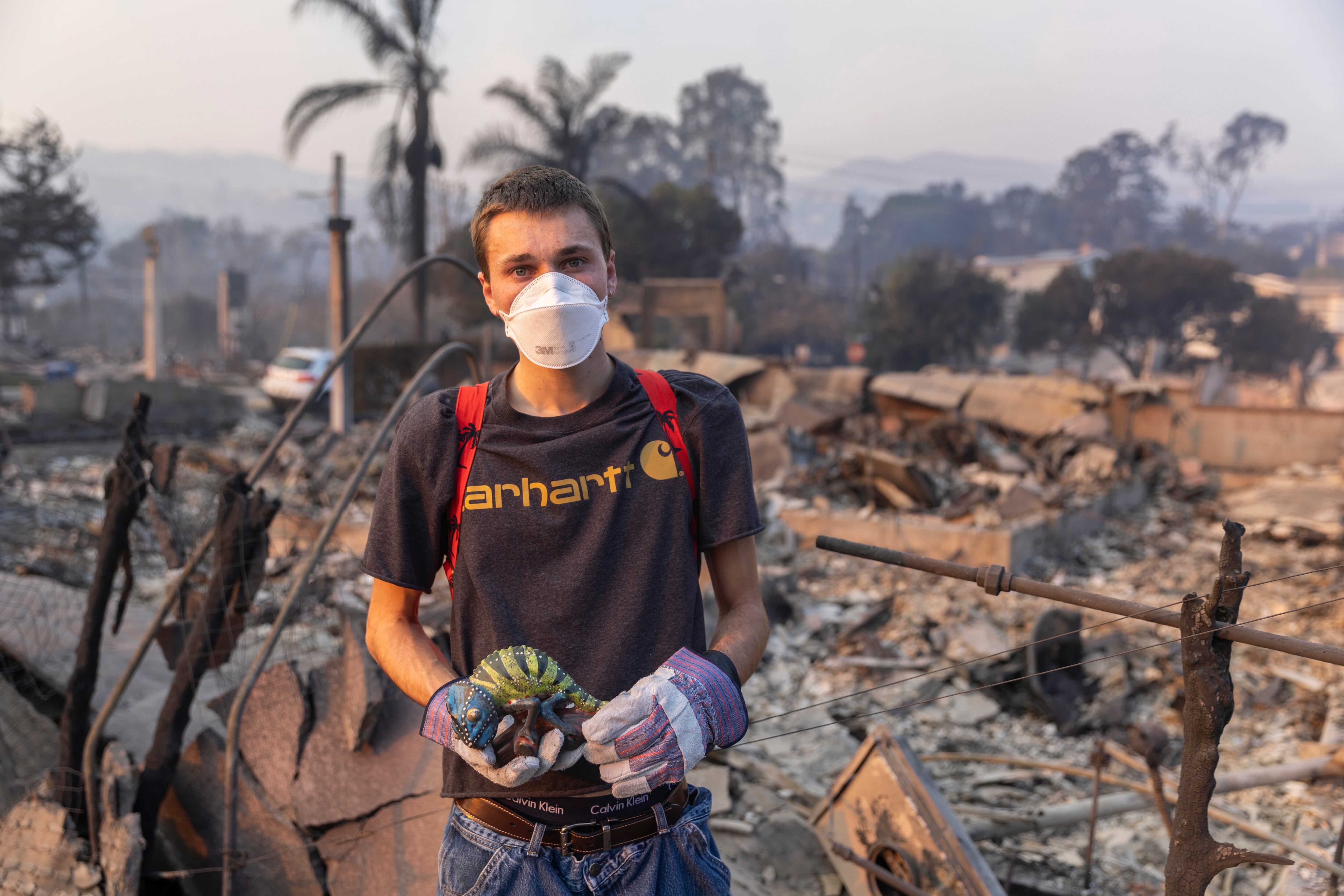 Caden Eckhoff, 20, at his home with his parents in Pacific Palisades, where he rescued a ceramic chameleon.