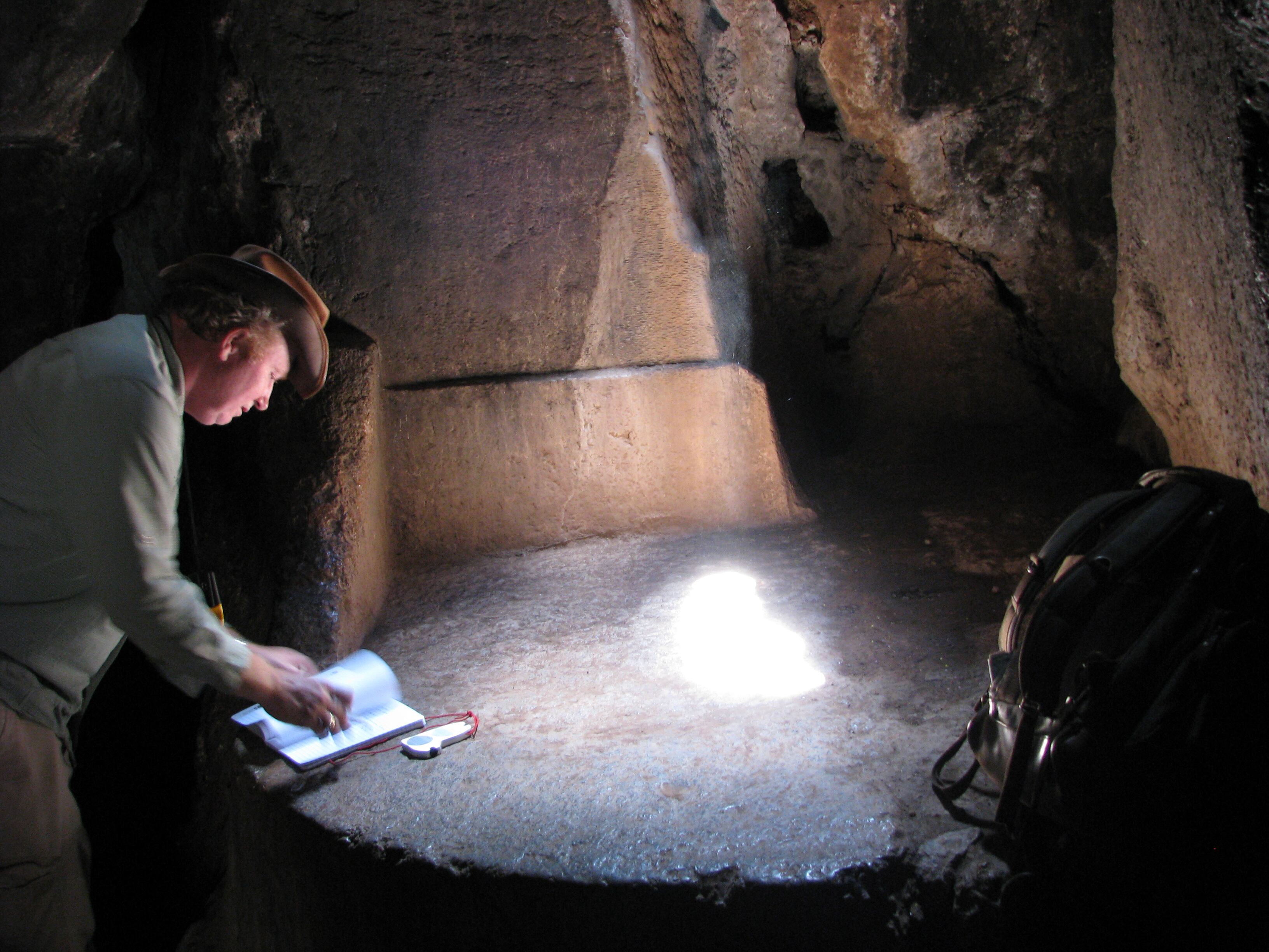 The zenithal sun shining on the altar of the inner chamber of a cave southeast of Lacco in Peru.