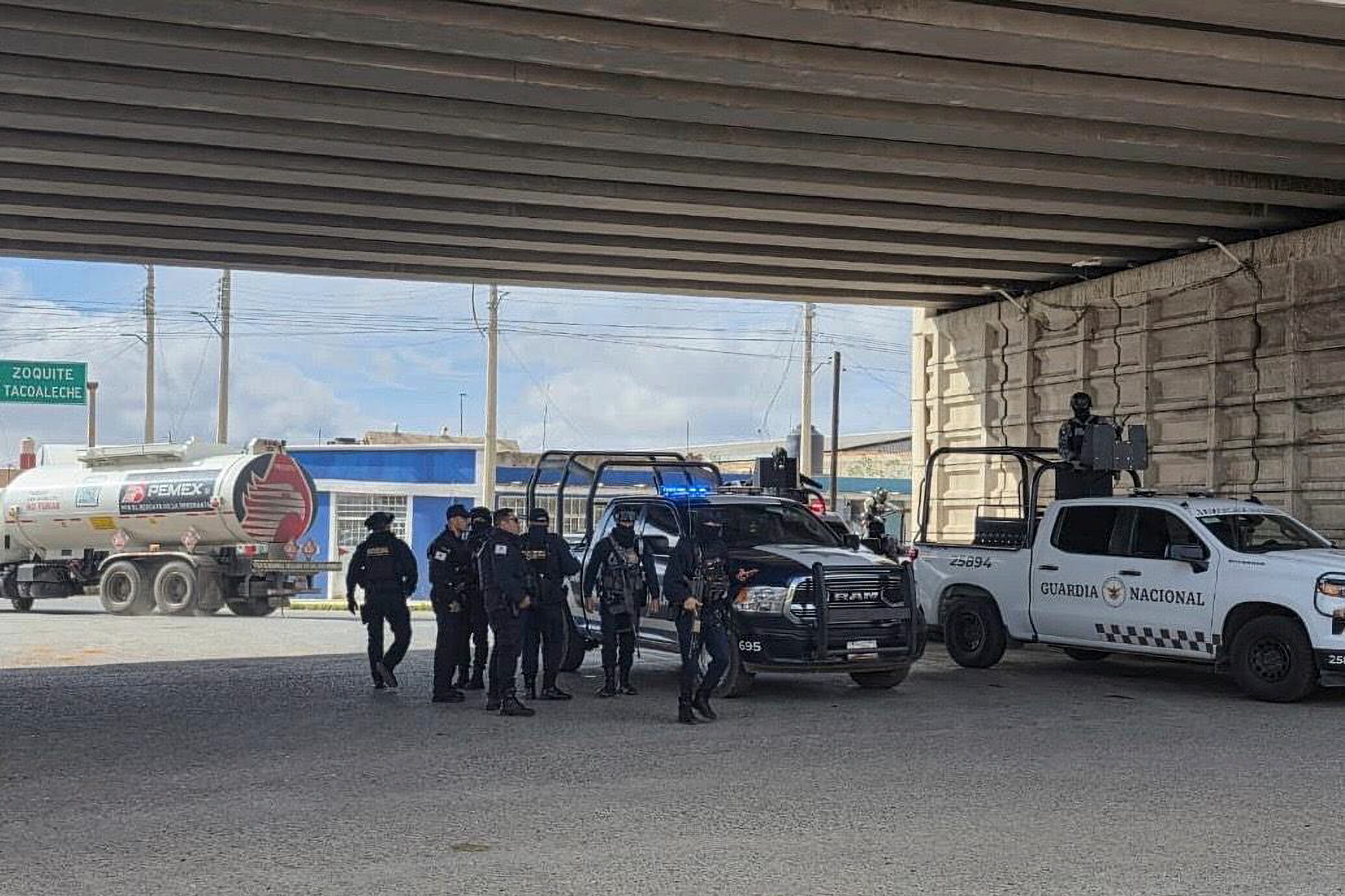 The latest massacre to hit Mexico: Business owners, local officials and bodies hung from a bridge