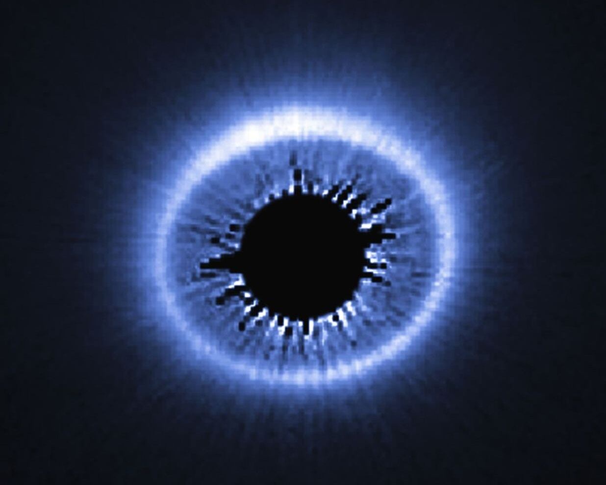 Image of the debris disk of the star HD 181327 taken by the Hubble telescope in 2014.