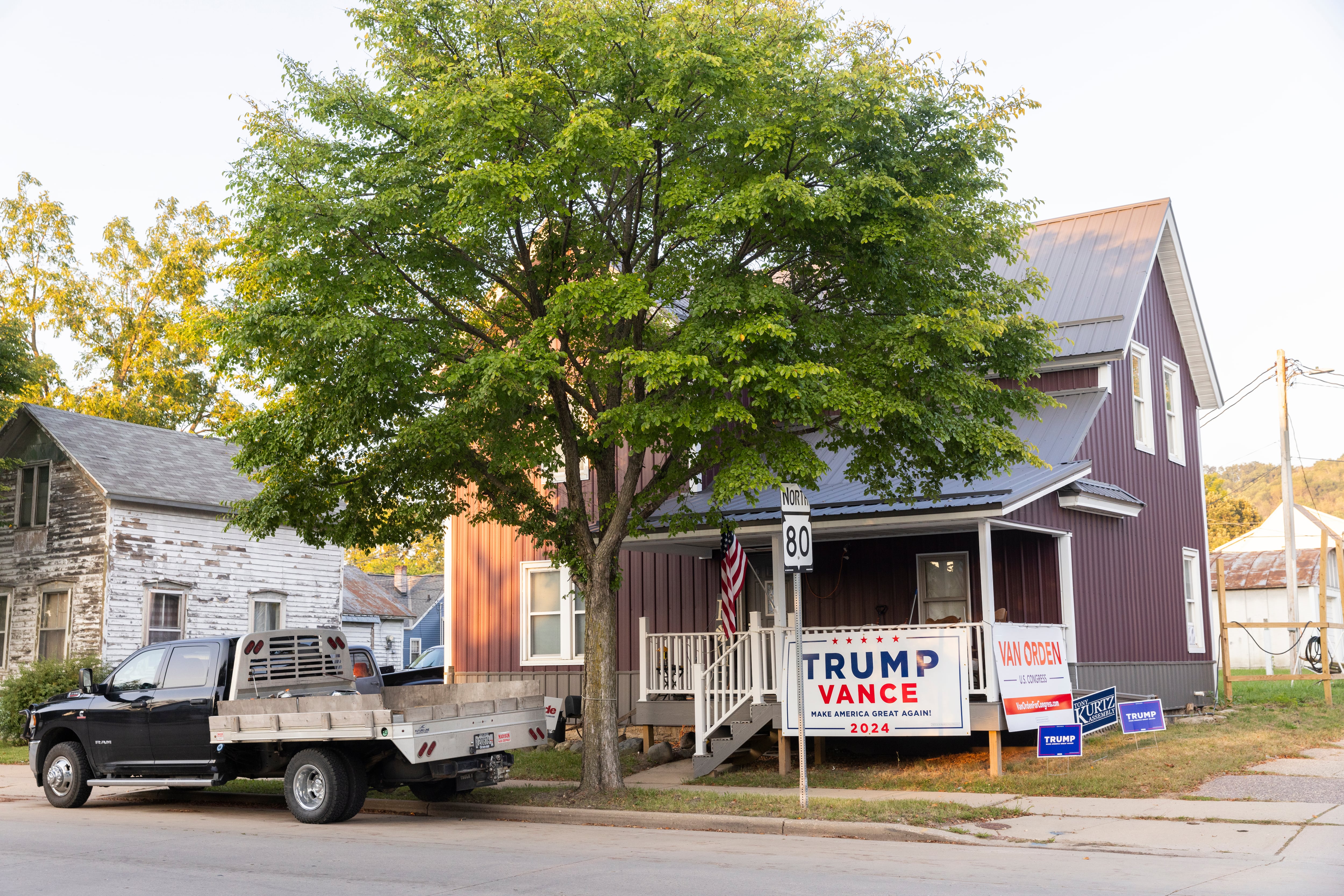 On the main street of Richland Center, a house displays pro-Trump signs. It’s located across the street from the Democratic Party’s county office. 