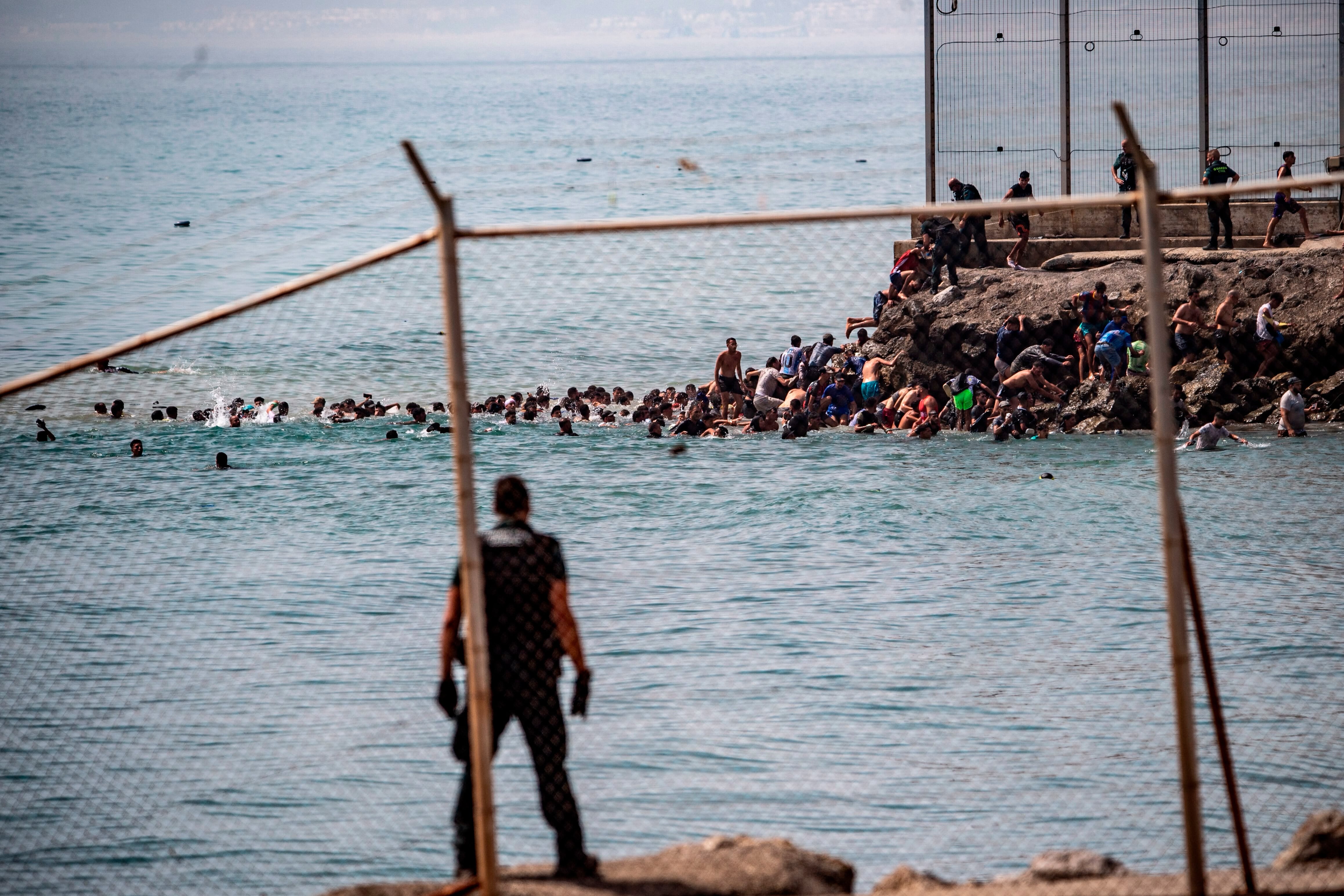 ‘Not Morocco!’ Thousands of migrants enter Ceuta and beg not to be sent back