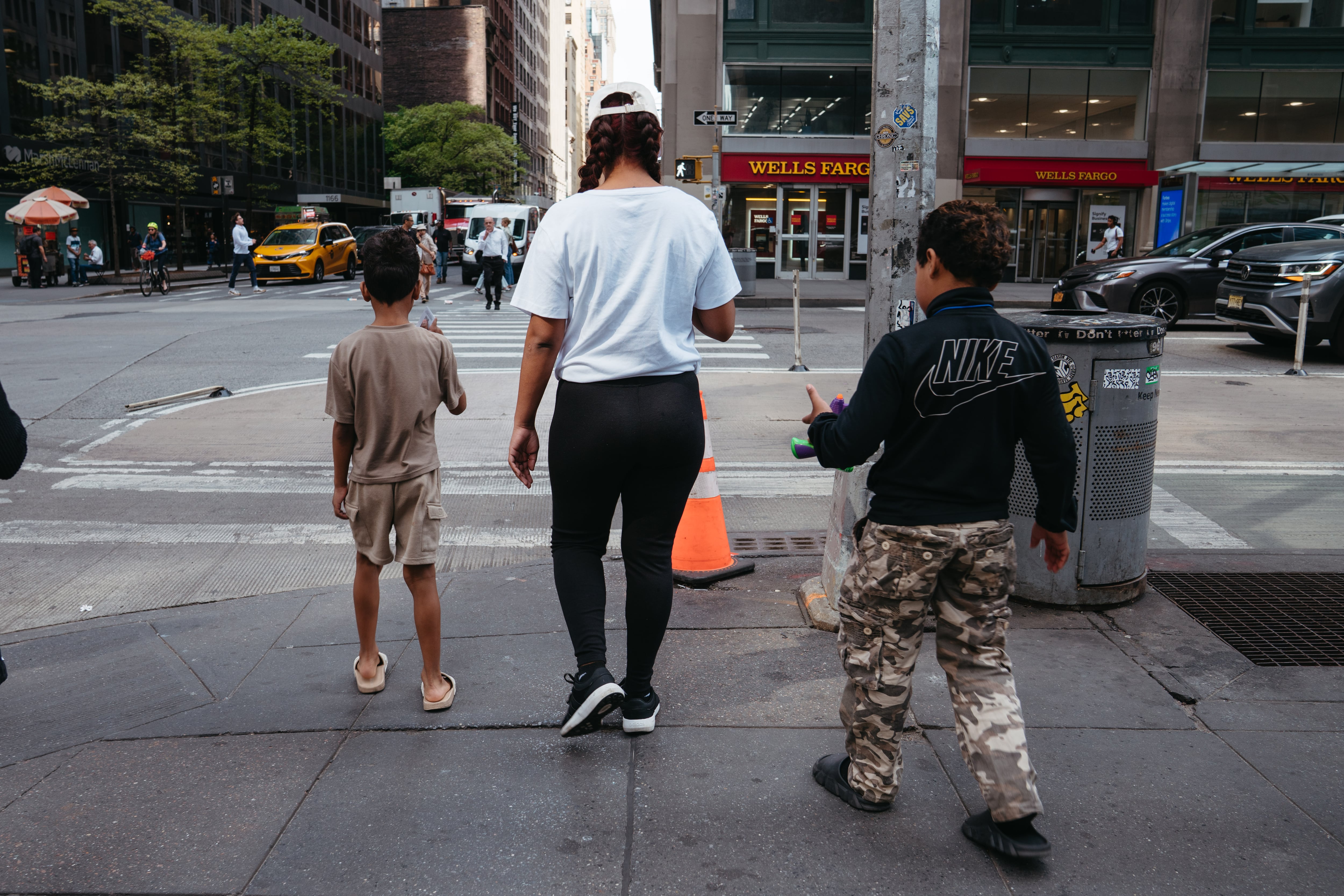 A migrant family near the Roosevelt Hotel in New York.